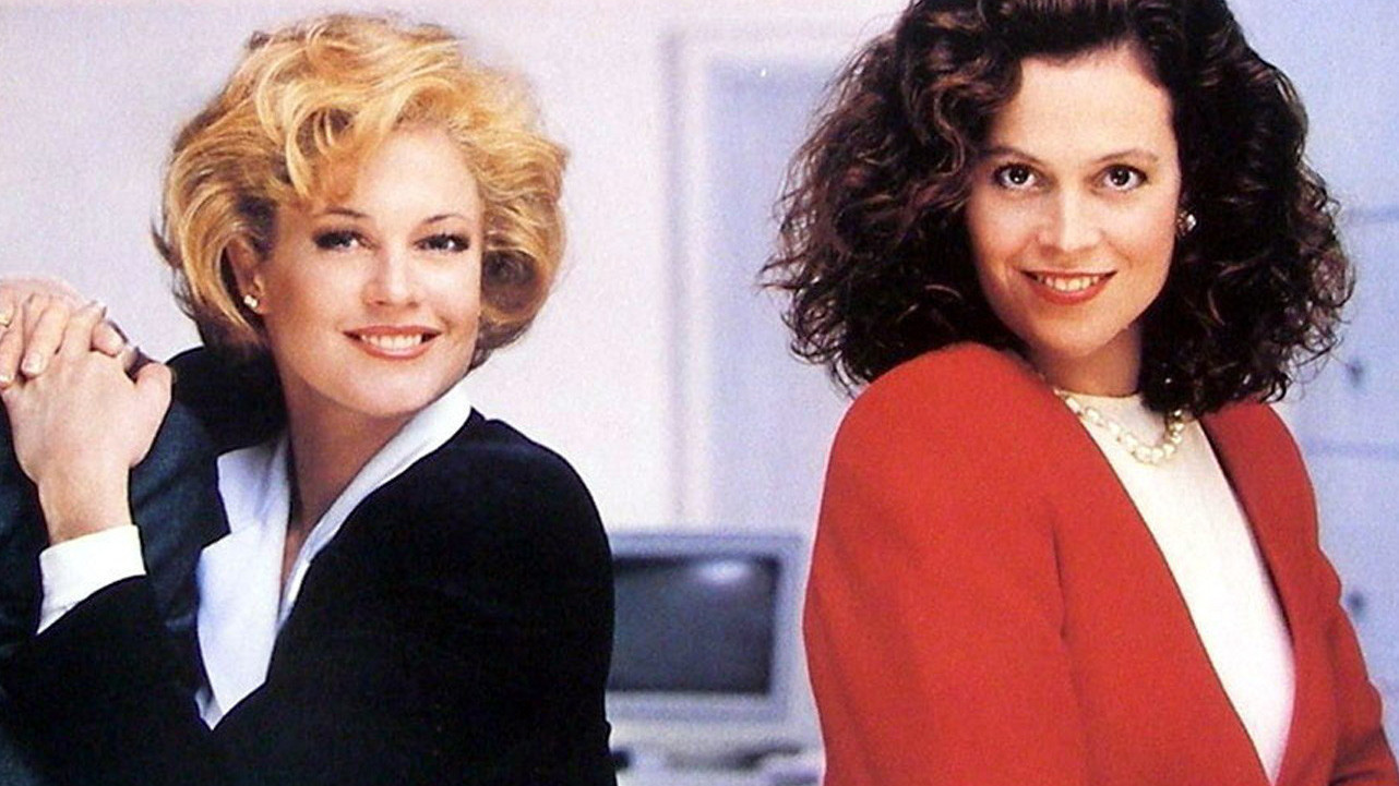A publicity still from the movie Working Girl, which prominently featured the beloved power suit.