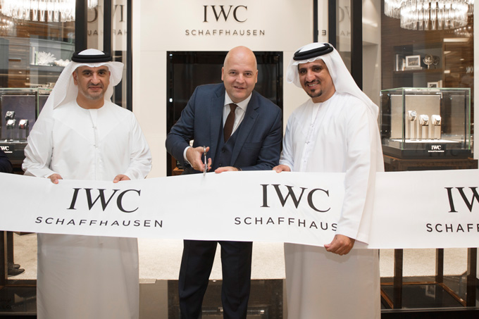 handout_mohammad_abulmagied_seddiqi_iwc_regional_brand_director_luc_rochereau_and_osama_seddiqi_