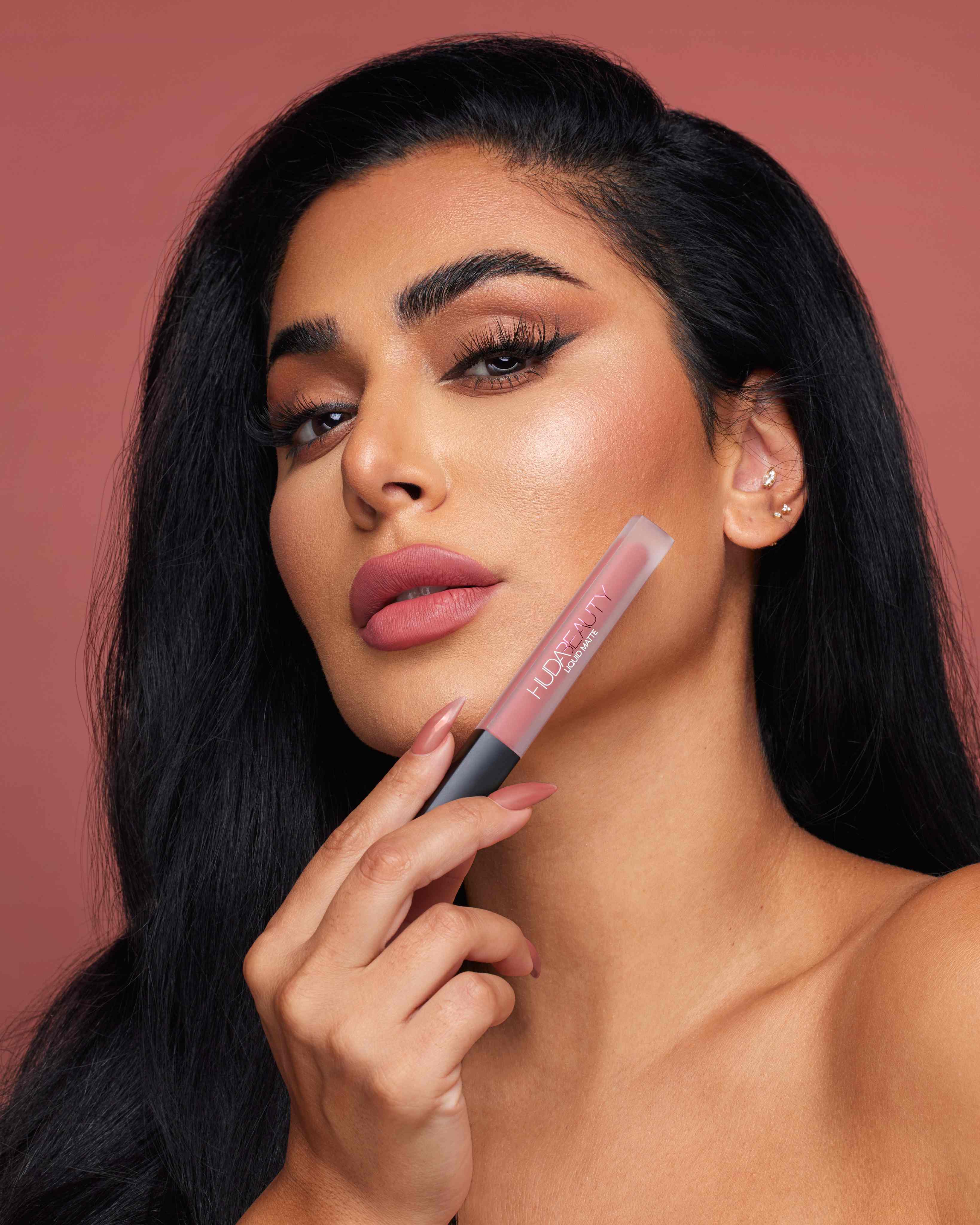 Huda Beauty Relaunches Her Iconic Liquid Matte Liquid Lipstick A E Huda Beauty Relaunches Her Iconic Liquid Matte Liquid Lipstick A E